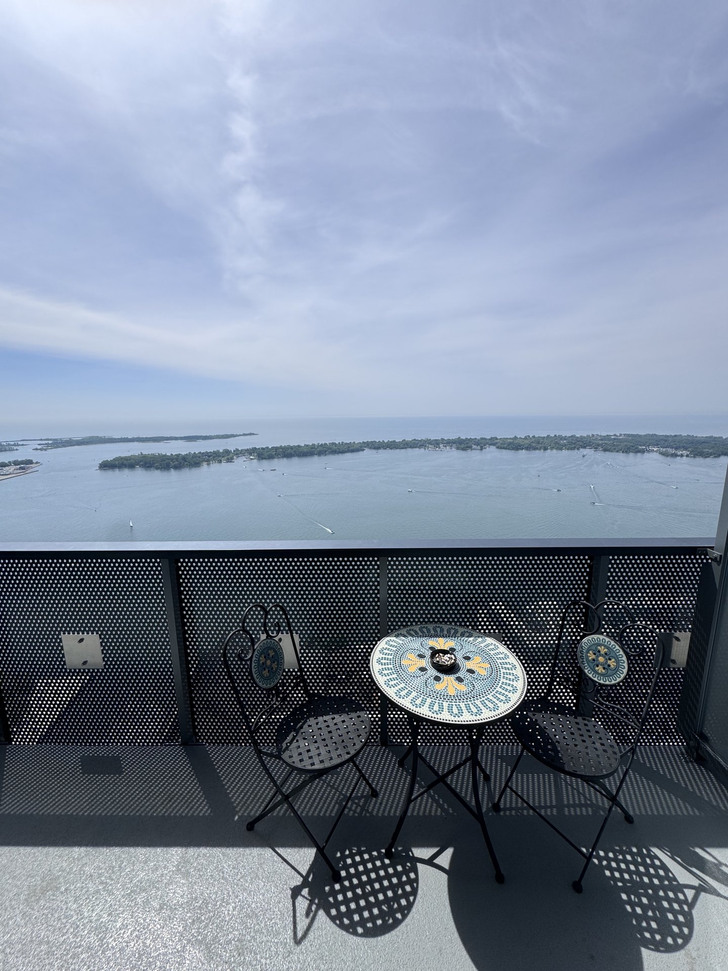 Private balcony with panoramic lake and island views