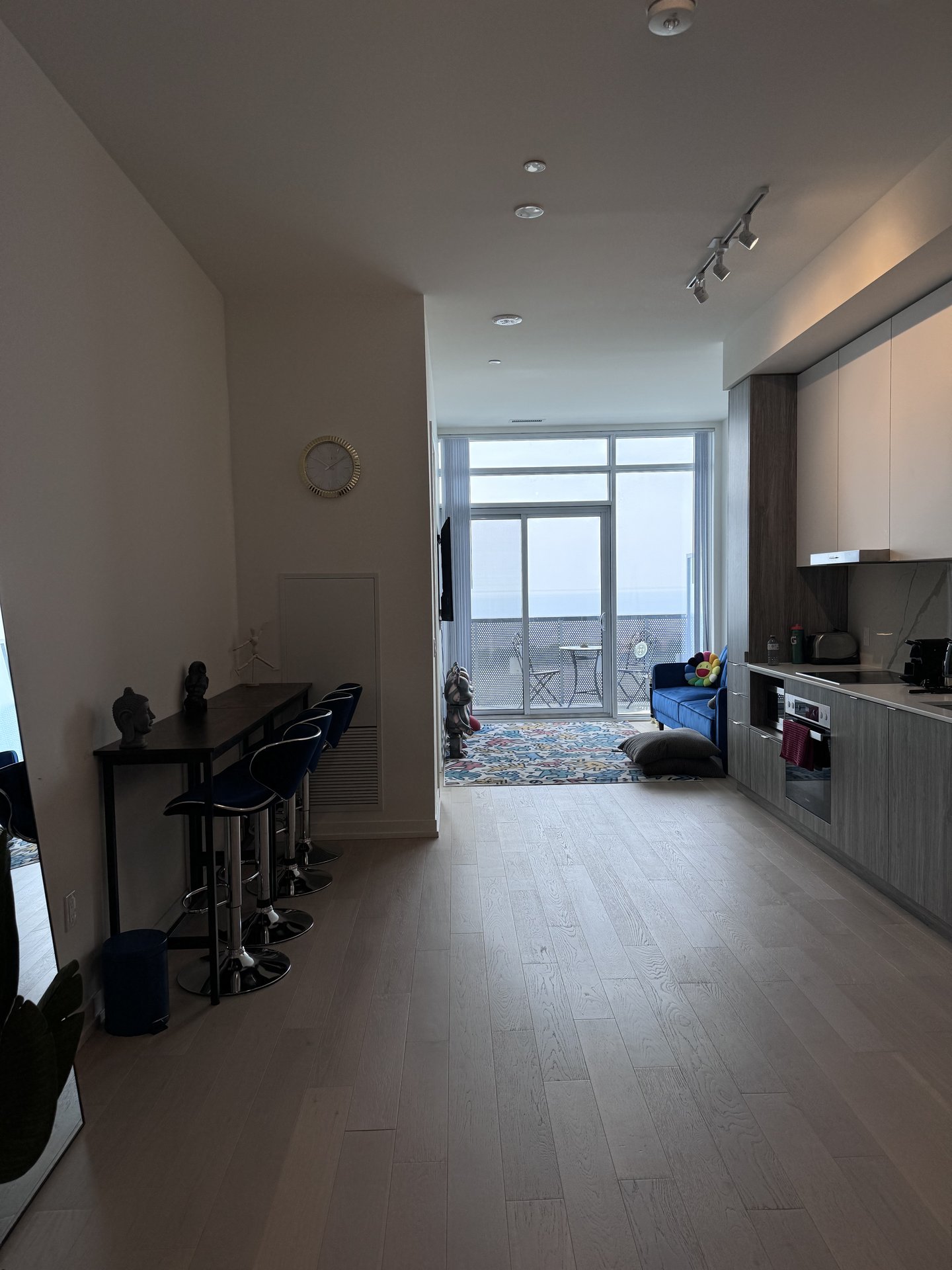 Open concept living, kitchen, and bar area