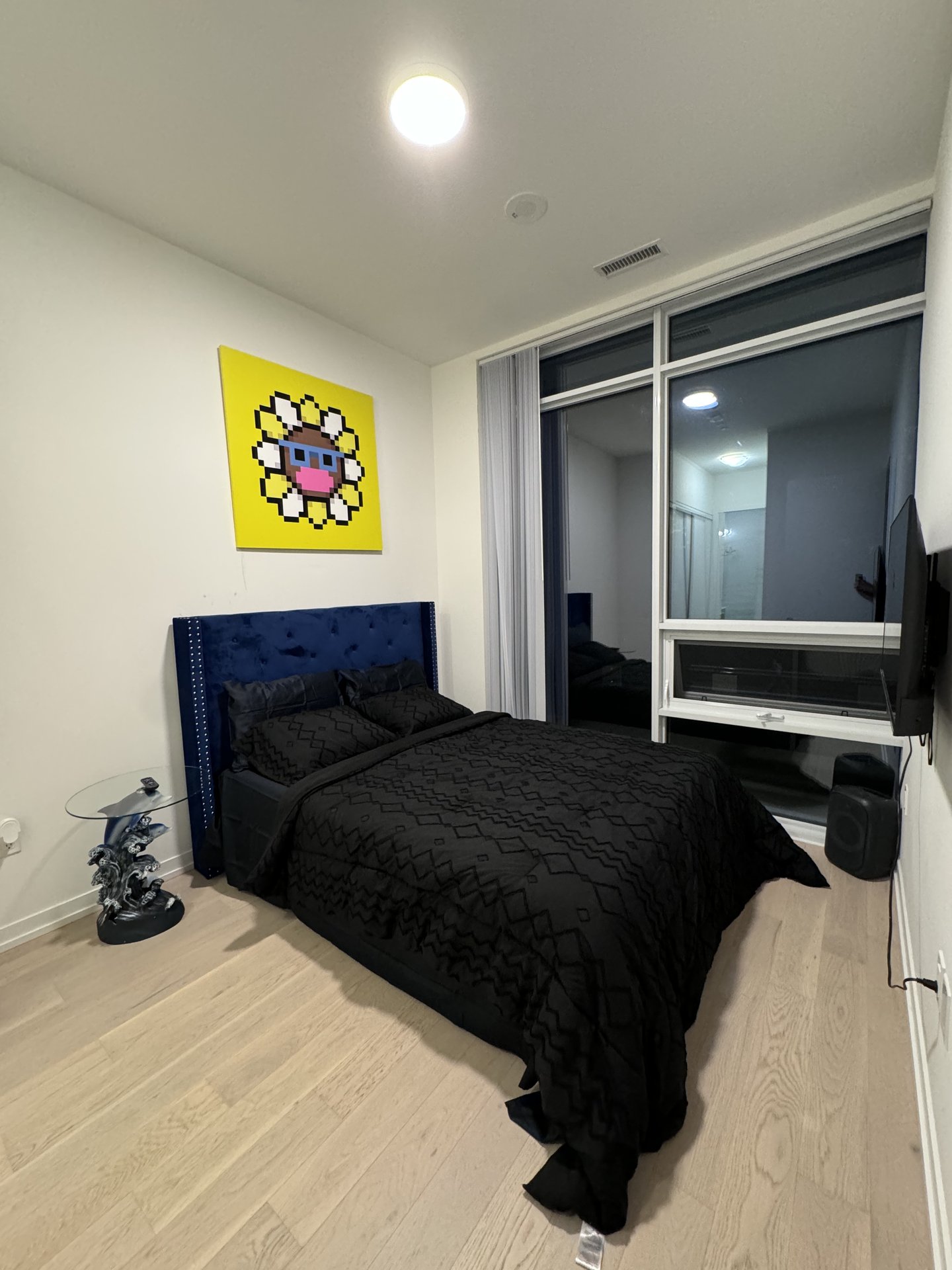 Bedroom with Murakami pixel flower canvas